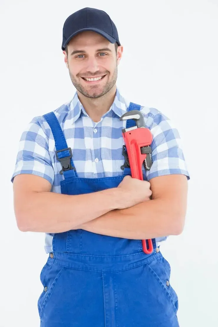 Professional plumber holding a pipe wrench