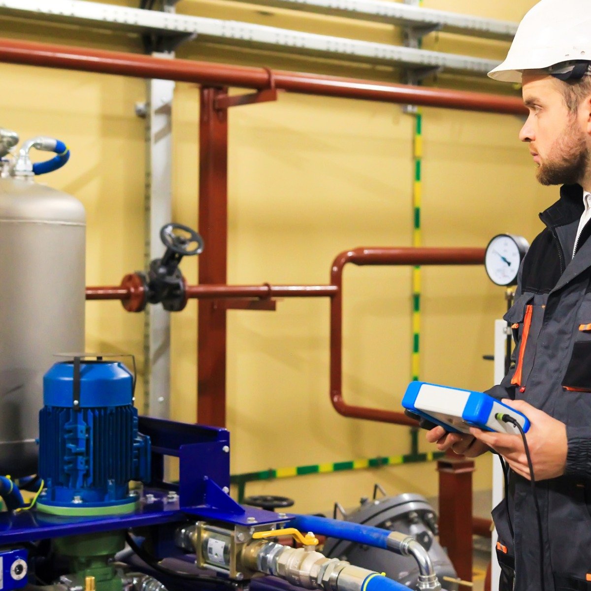 Commercial plumbing maintenance on building pipework